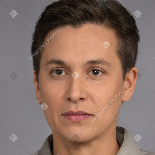 Joyful white adult male with short  brown hair and brown eyes