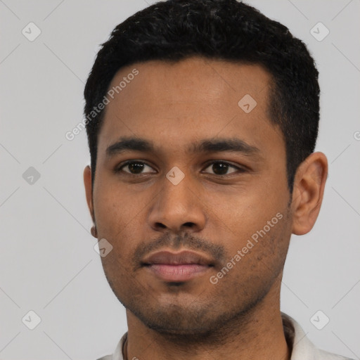 Neutral latino young-adult male with short  black hair and brown eyes