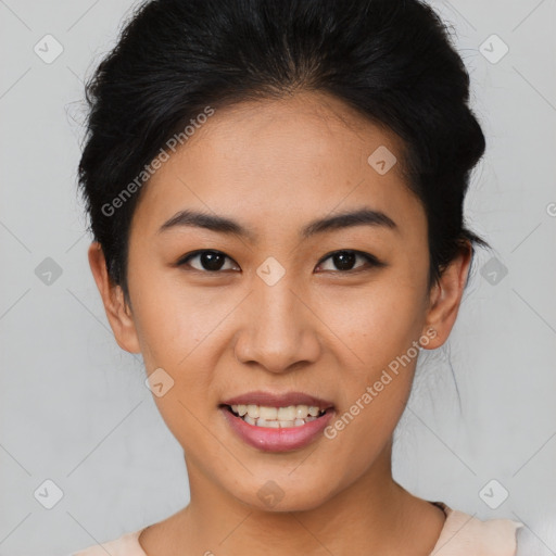 Joyful asian young-adult female with short  brown hair and brown eyes