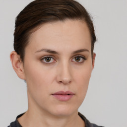 Neutral white young-adult female with short  brown hair and brown eyes