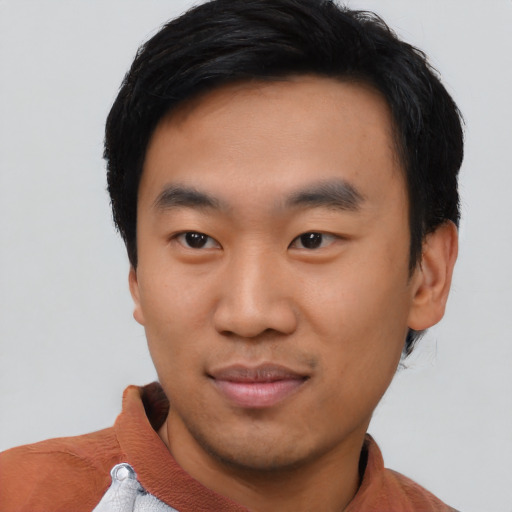 Neutral asian young-adult male with short  black hair and brown eyes