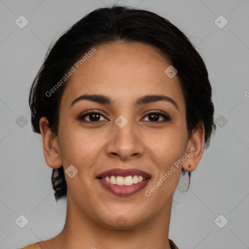 Joyful latino young-adult female with medium  brown hair and brown eyes