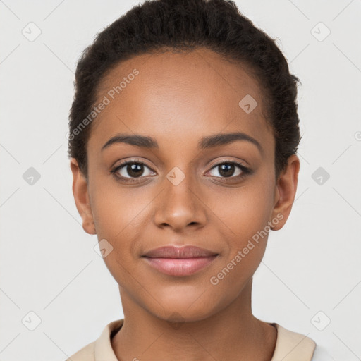 Joyful latino young-adult female with short  brown hair and brown eyes