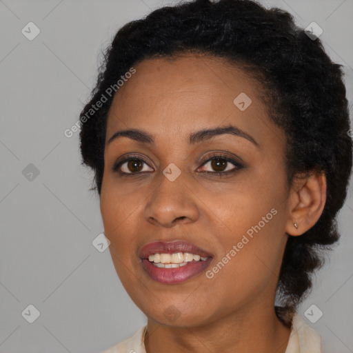 Joyful black young-adult female with medium  black hair and brown eyes