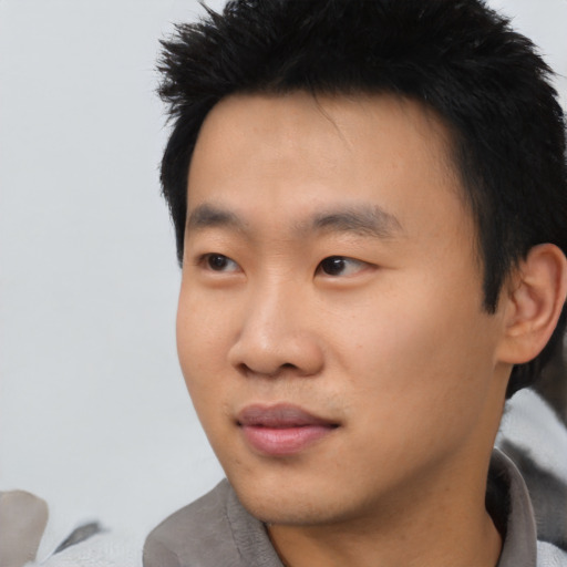 Neutral asian young-adult male with short  black hair and brown eyes