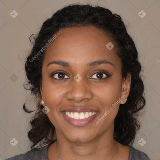 Joyful black young-adult female with medium  black hair and brown eyes