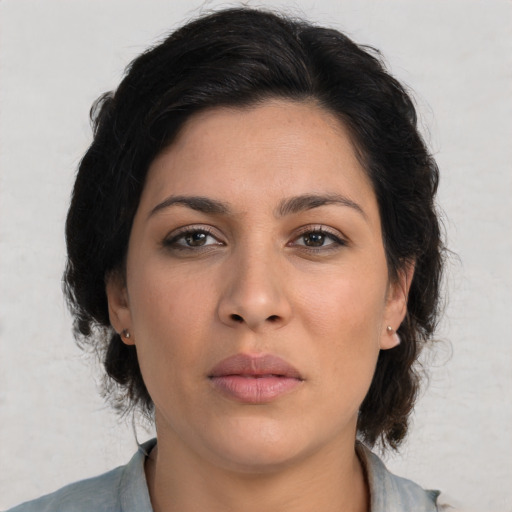 Neutral asian young-adult female with medium  brown hair and brown eyes
