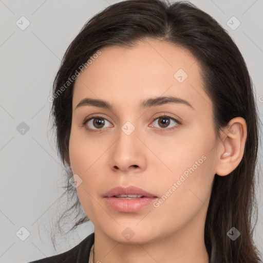 Neutral white young-adult female with long  brown hair and brown eyes