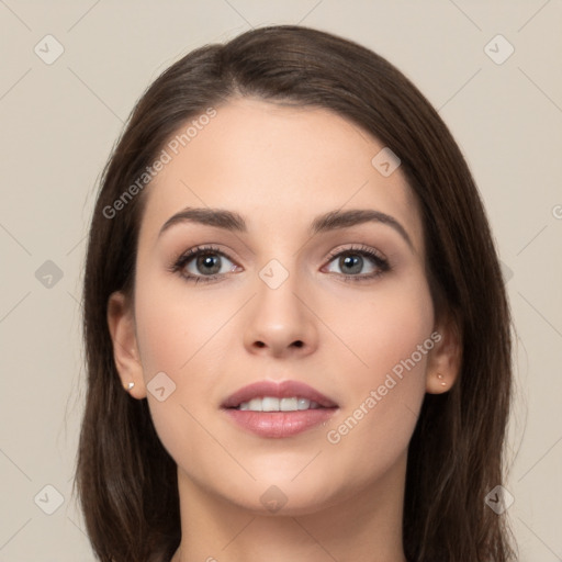 Neutral white young-adult female with long  brown hair and brown eyes