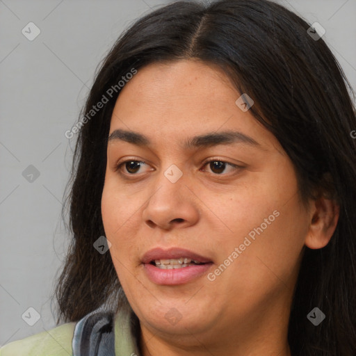 Joyful asian young-adult female with long  brown hair and brown eyes