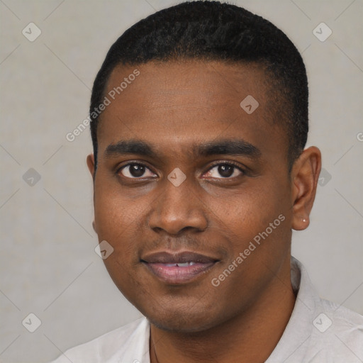 Joyful black young-adult male with short  black hair and brown eyes