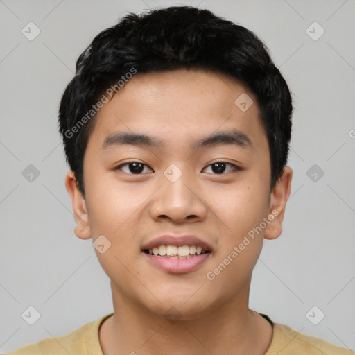 Joyful asian young-adult male with short  black hair and brown eyes