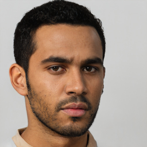 Neutral latino young-adult male with short  black hair and brown eyes