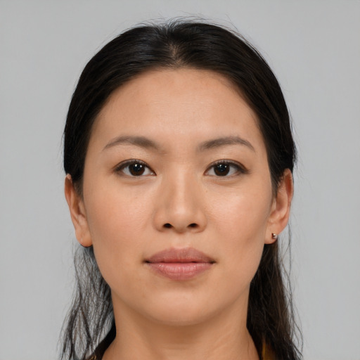 Neutral asian young-adult female with long  brown hair and brown eyes