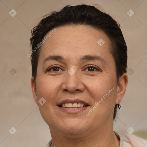 Joyful white adult female with short  brown hair and brown eyes