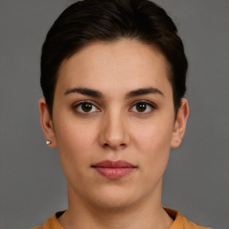 Neutral white young-adult female with short  brown hair and brown eyes