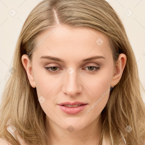 Joyful white young-adult female with long  brown hair and blue eyes