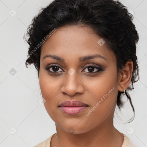 Joyful latino young-adult female with long  brown hair and brown eyes