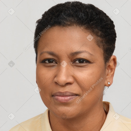 Joyful black young-adult female with short  brown hair and brown eyes