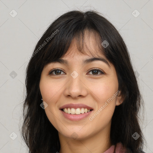 Joyful white young-adult female with long  brown hair and brown eyes