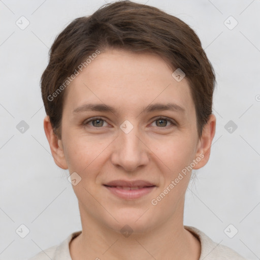 Joyful white young-adult female with short  brown hair and grey eyes