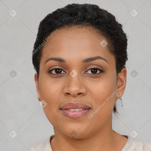 Joyful black young-adult female with short  brown hair and brown eyes