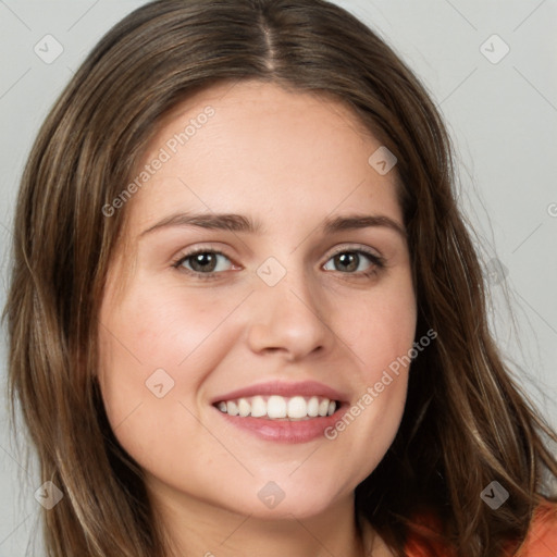 Joyful white young-adult female with long  brown hair and green eyes