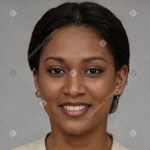 Joyful latino young-adult female with short  black hair and brown eyes