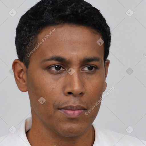 Neutral latino young-adult male with short  brown hair and brown eyes