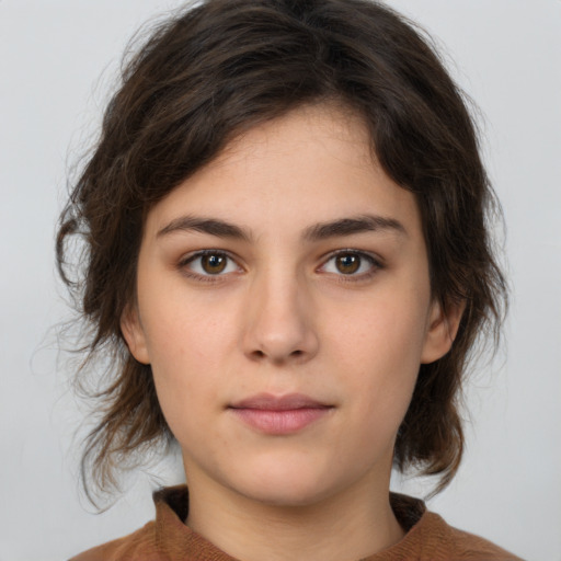 Neutral white young-adult female with medium  brown hair and brown eyes