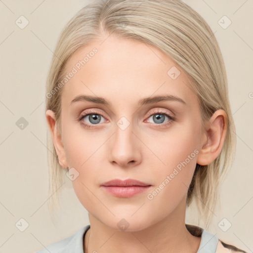 Neutral white young-adult female with medium  brown hair and blue eyes