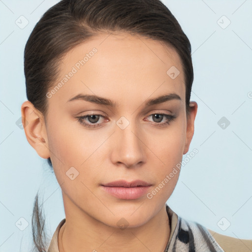 Neutral white young-adult female with medium  brown hair and brown eyes