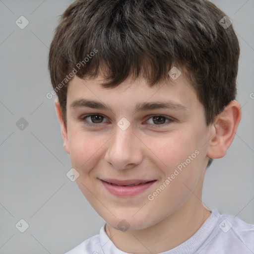 Joyful white child male with short  brown hair and brown eyes