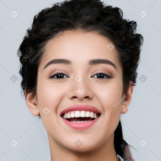 Joyful white young-adult female with long  black hair and brown eyes