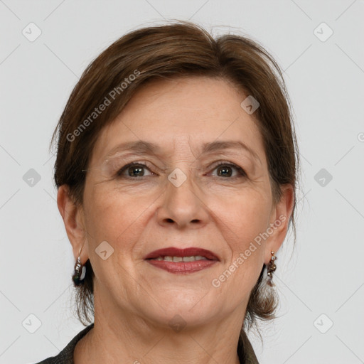 Joyful white adult female with medium  brown hair and grey eyes