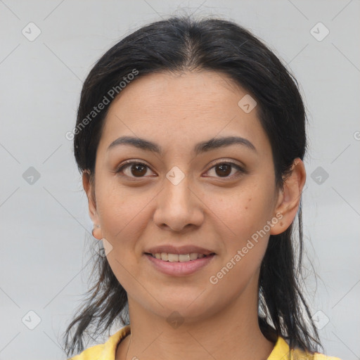 Joyful asian young-adult female with medium  brown hair and brown eyes