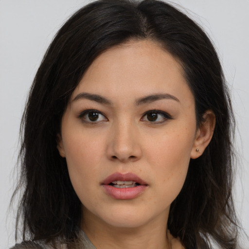 Neutral asian young-adult female with long  brown hair and brown eyes