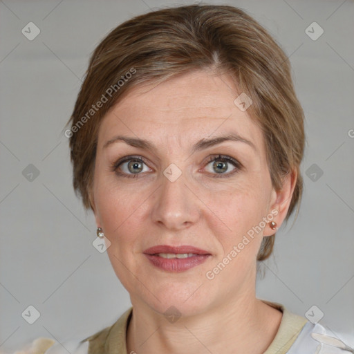 Joyful white adult female with medium  brown hair and grey eyes