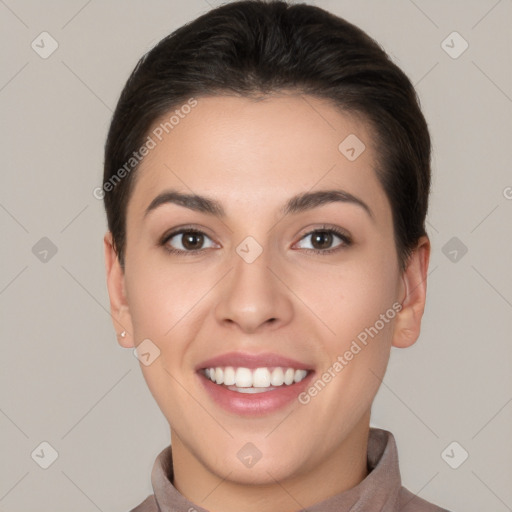 Joyful white young-adult female with short  brown hair and brown eyes