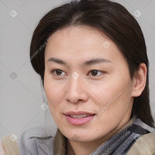 Joyful white young-adult female with medium  brown hair and brown eyes