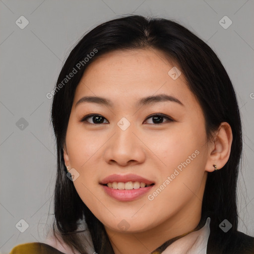 Joyful asian young-adult female with medium  brown hair and brown eyes