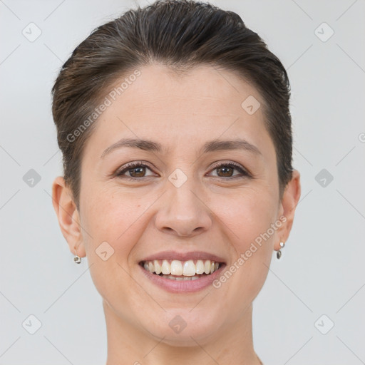 Joyful white young-adult female with short  brown hair and brown eyes