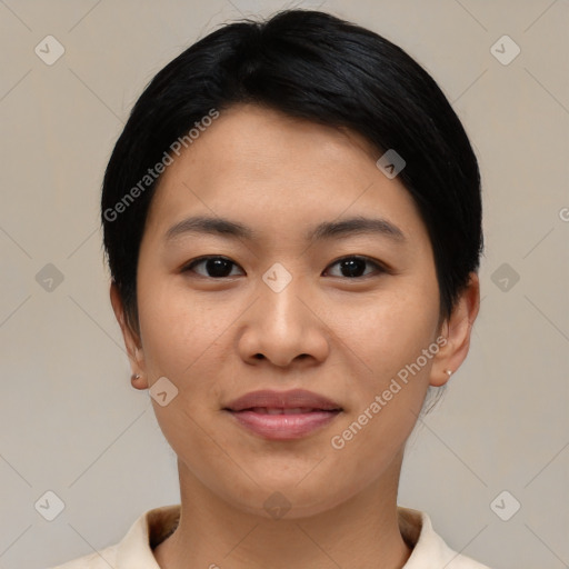 Joyful asian young-adult female with short  black hair and brown eyes