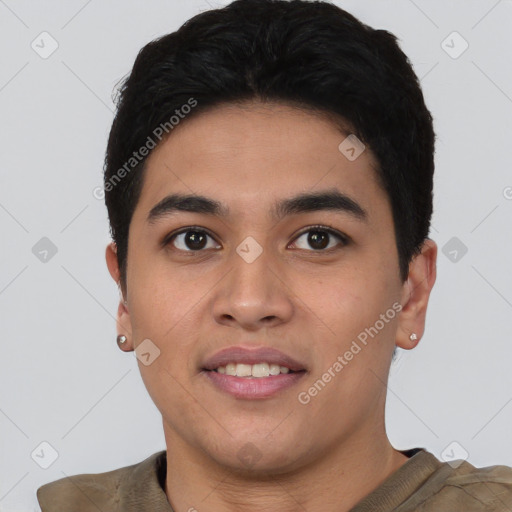 Joyful asian young-adult male with short  brown hair and brown eyes