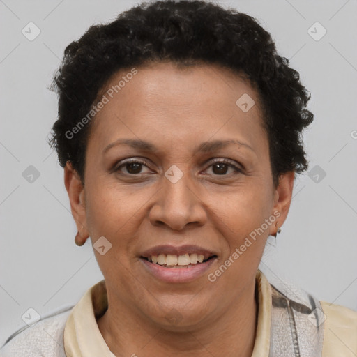 Joyful black adult female with short  brown hair and brown eyes