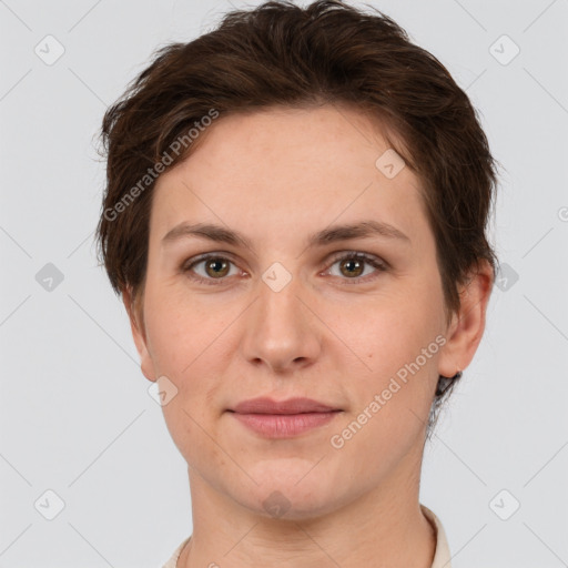 Joyful white young-adult female with short  brown hair and grey eyes