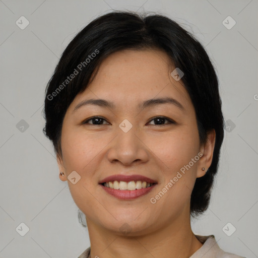 Joyful asian young-adult female with medium  brown hair and brown eyes