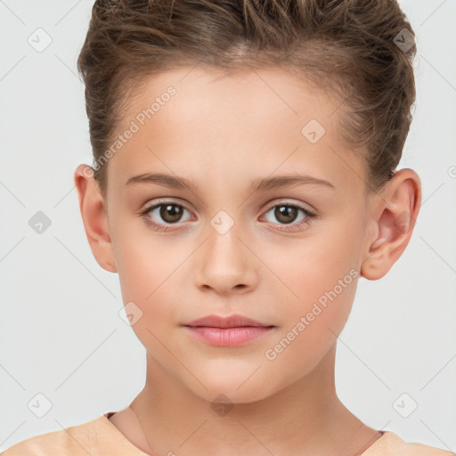 Joyful white child female with short  brown hair and brown eyes