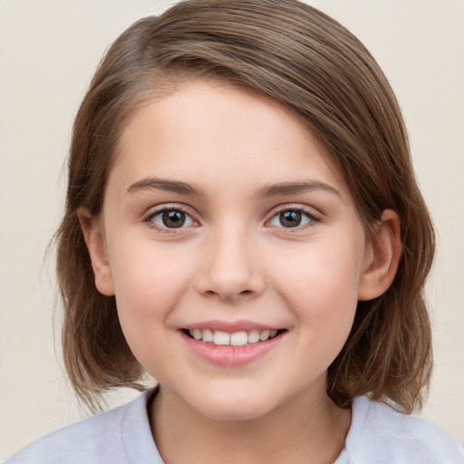 Joyful white child female with medium  brown hair and brown eyes