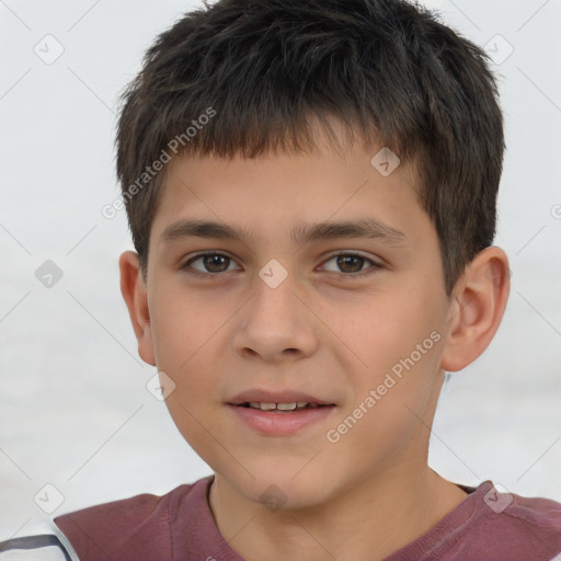 Joyful white child male with short  brown hair and brown eyes